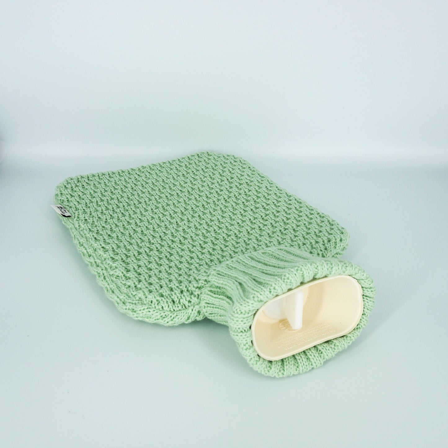 Bouillotte à eau version Jersey : conserve la chaleur pendant 8 heures